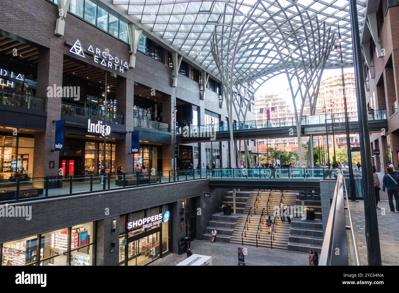 Inside the covered retail area of 'The Well' in Toronto, Canada, during the day Stock Photo