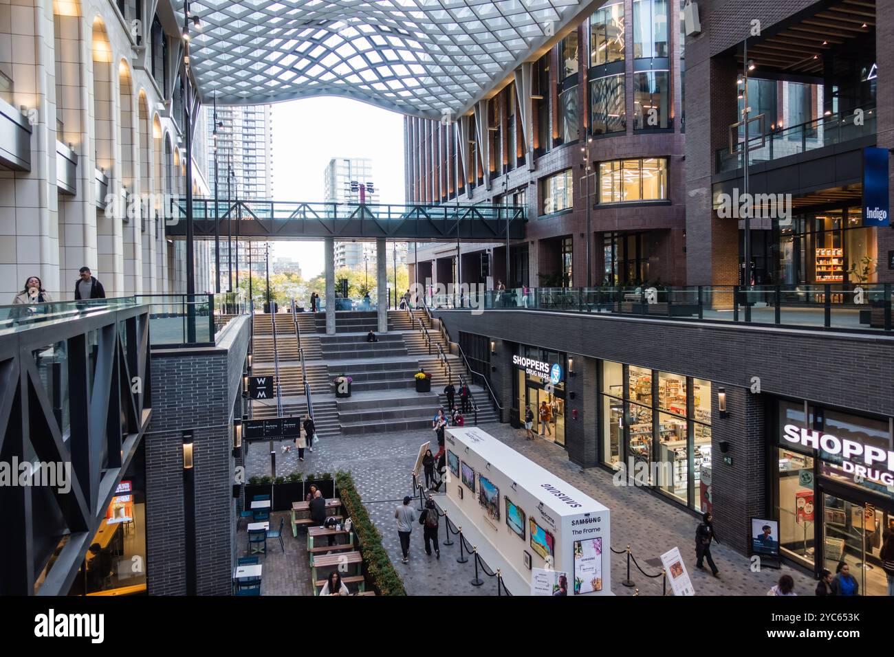 Inside the covered retail area of 'The Well' in Toronto, Canada, during the day Stock Photo