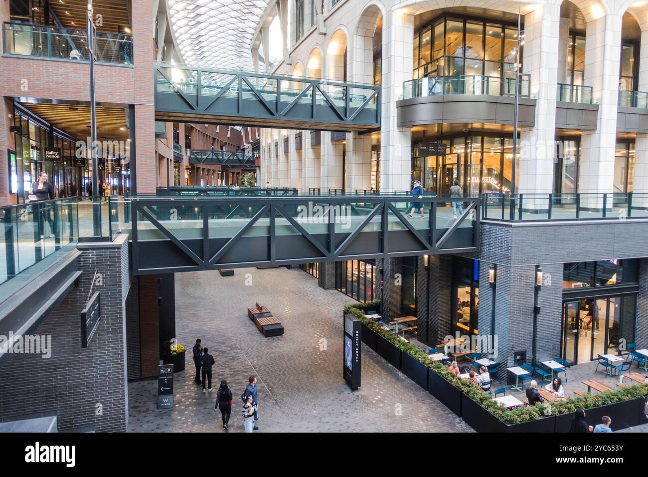 Inside the covered retail area of 'The Well' in Toronto, Canada, during the day Stock Photo