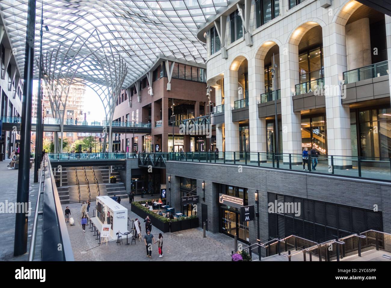 Inside the covered retail area of 'The Well' in Toronto, Canada, during the day Stock Photo