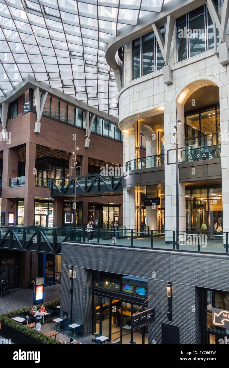 Inside the covered retail area of 'The Well' in Toronto, Canada, during the day. Stock Photo