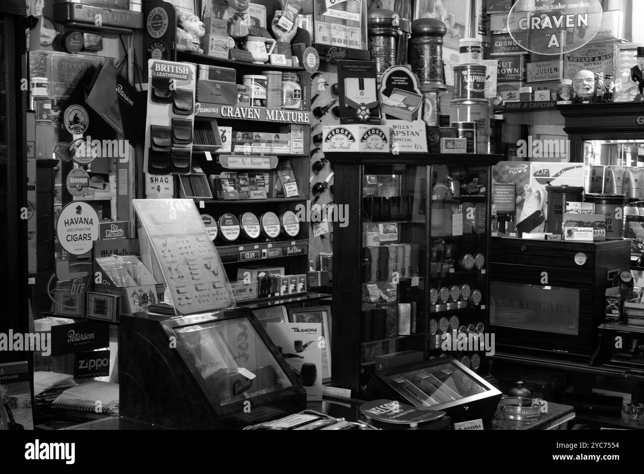 Interior view of tobacco products for sale in traditional tobacconist. Stock Photo