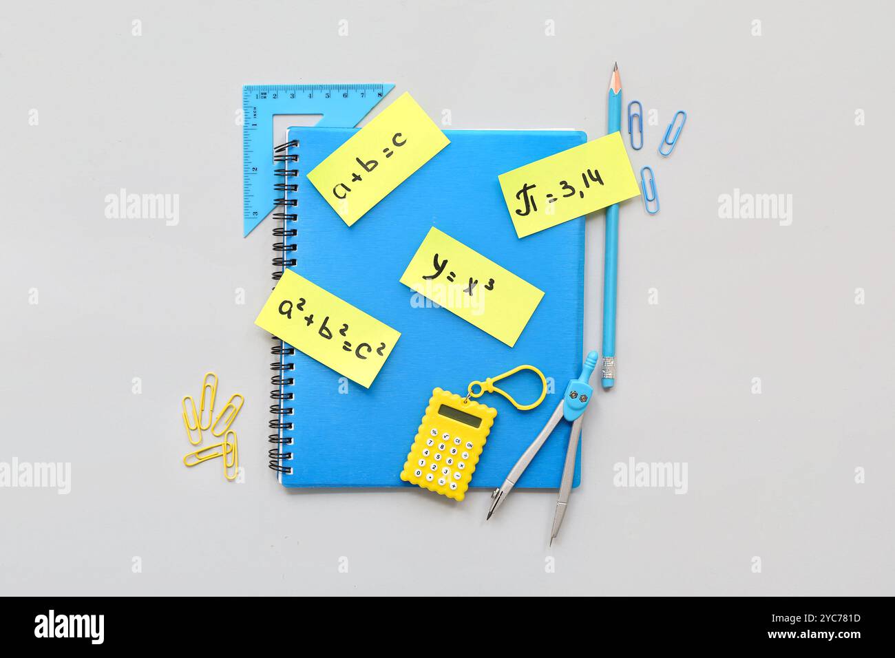School stationery with different math formulas and equations on grey ...