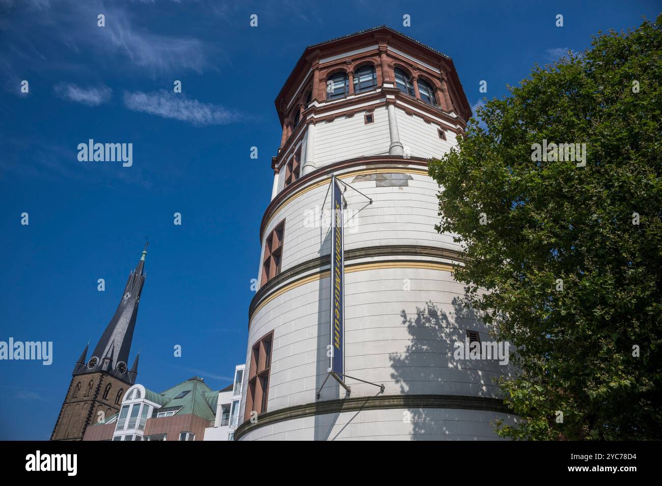 The Castle Tower and the Rhine River promenade along the old town of Dusseldorf, Germany. Stock Photo