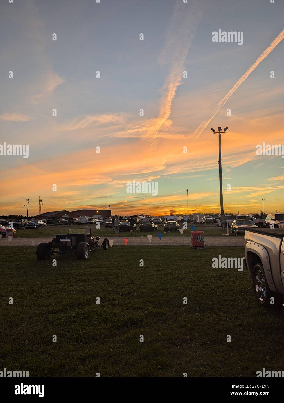 Streaky Sky at the car show - Smartphone Captured Stock Image