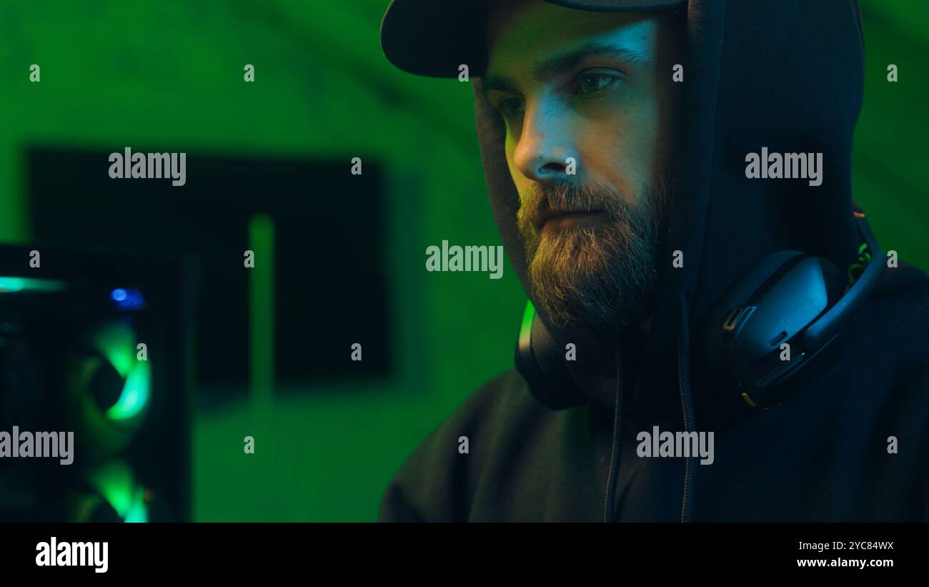Thoughtful programmer man typing code computer thinking male guy technology working internet connect cyberspace hacker network web user system website Stock Photo