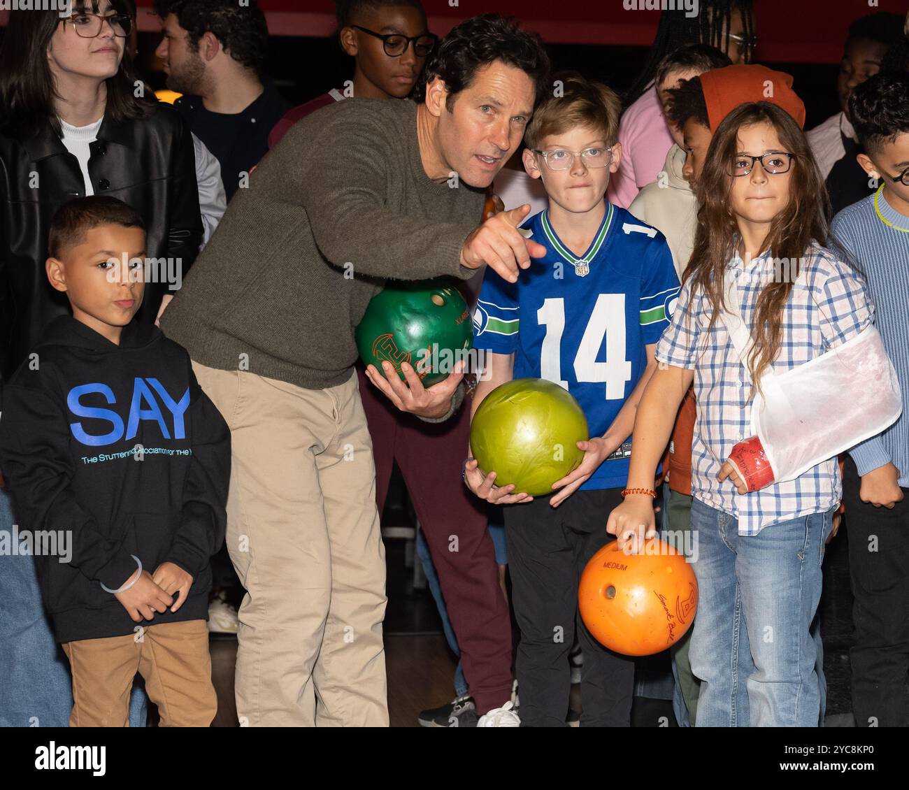Paul Rudd (C) bowls with young people at his 11th Annual AllStar