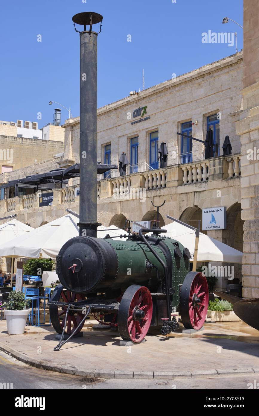 This rusting, 130-year-old steam locomotive is a popular tourist attraction outside the Maritime Museum, Vittoriosa, Malta, Europe Stock Photo