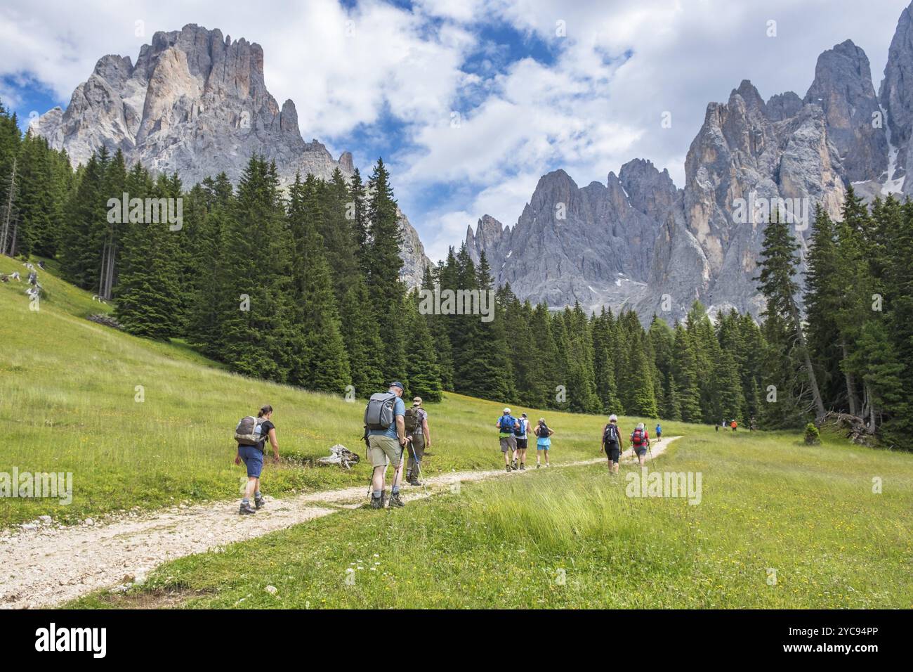 People hiking in the Dolomites Alps Stock Photo - Alamy