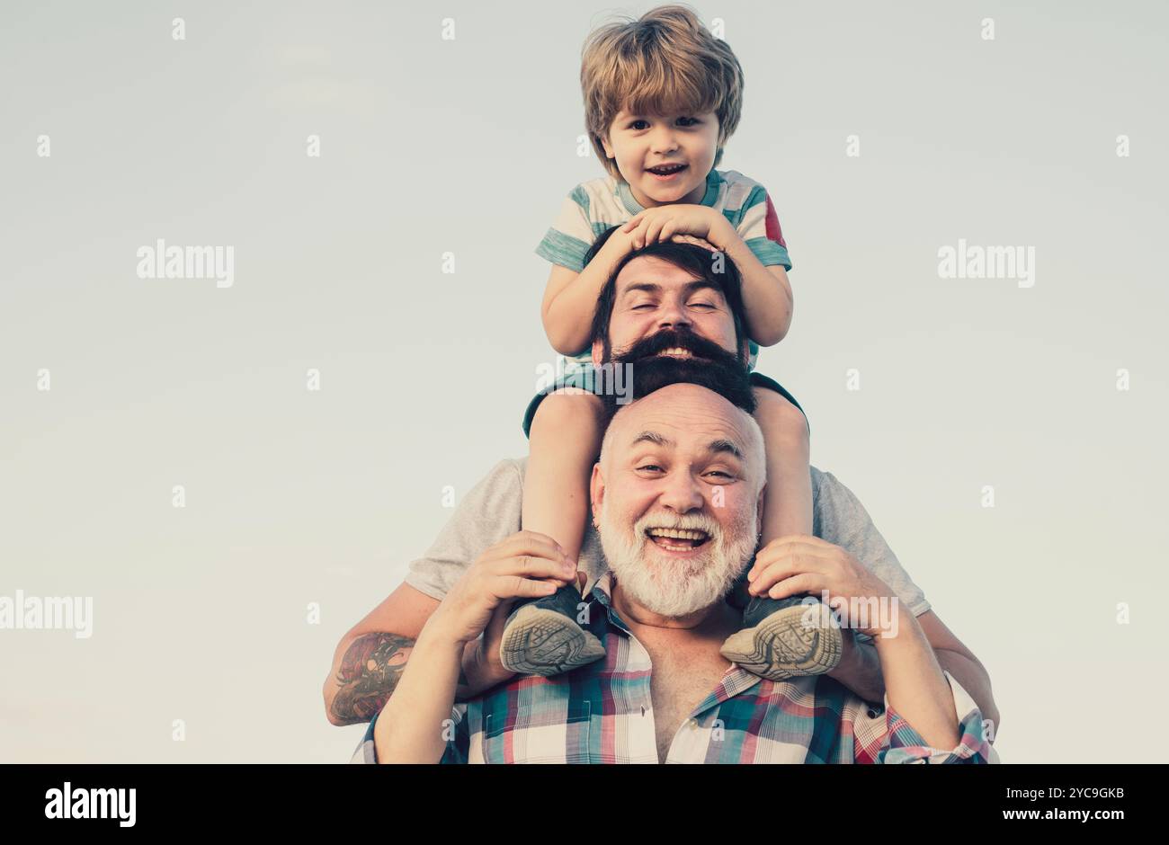 Grandfather son piggyback ride hi-res stock photography and images - Alamy