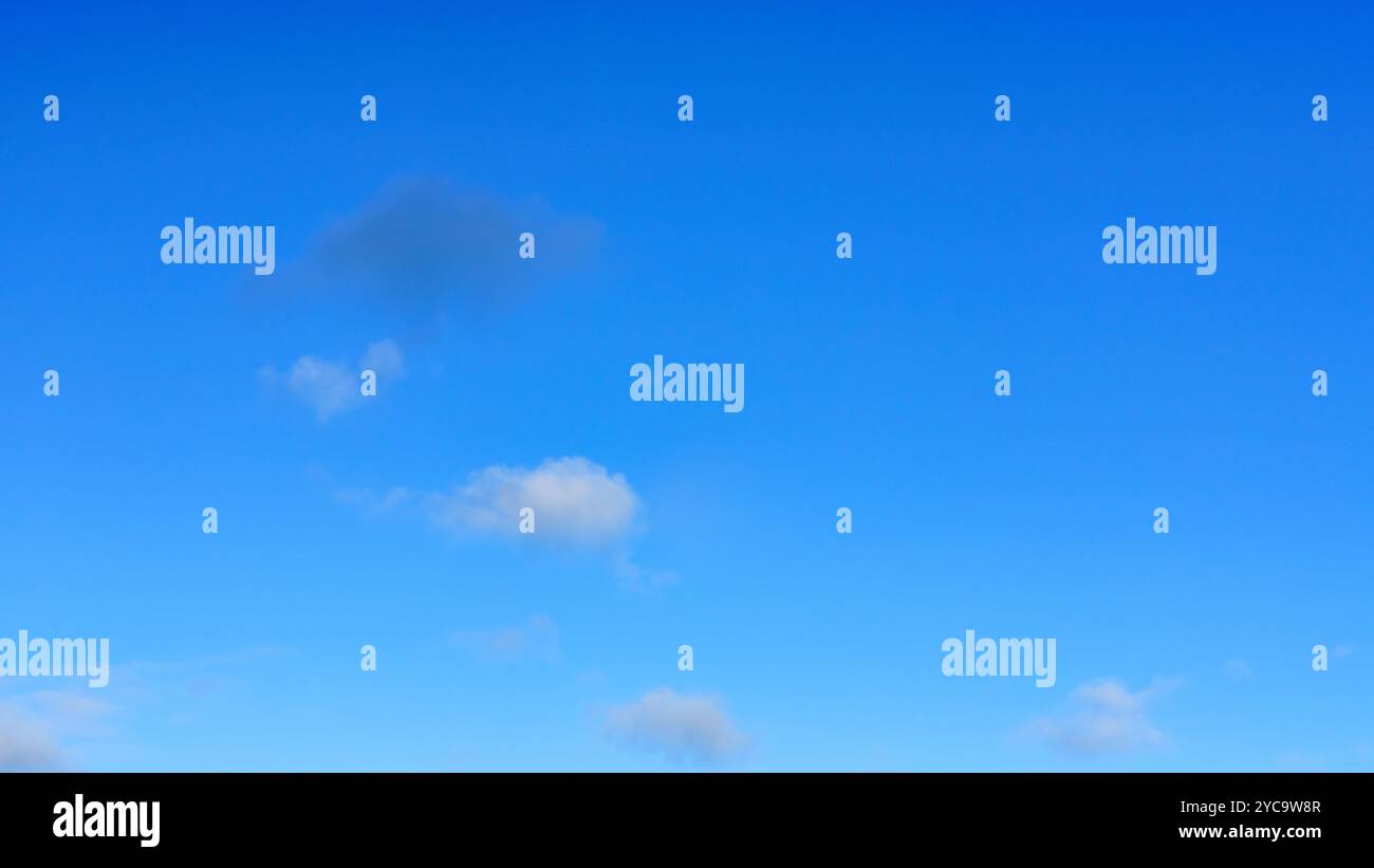 Beautiful blue sky with a few clouds Stock Photo - Alamy