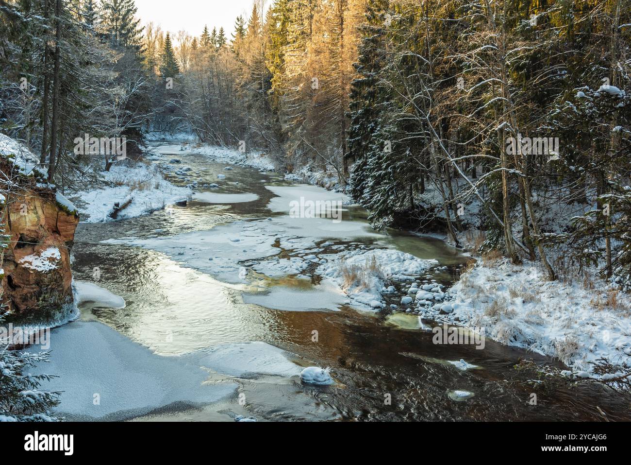 Amata river, Latvia on snowy and sunny winter day Stock Photo