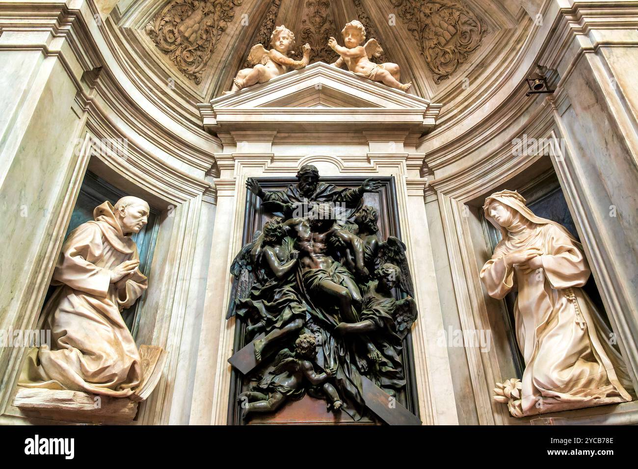 Bronze altarpiece depicting the Deposition, designed by Cosimo Fancelli in the Chigi Chapel of Santa Maria della Pace, Rome, Italy. Stock Photo