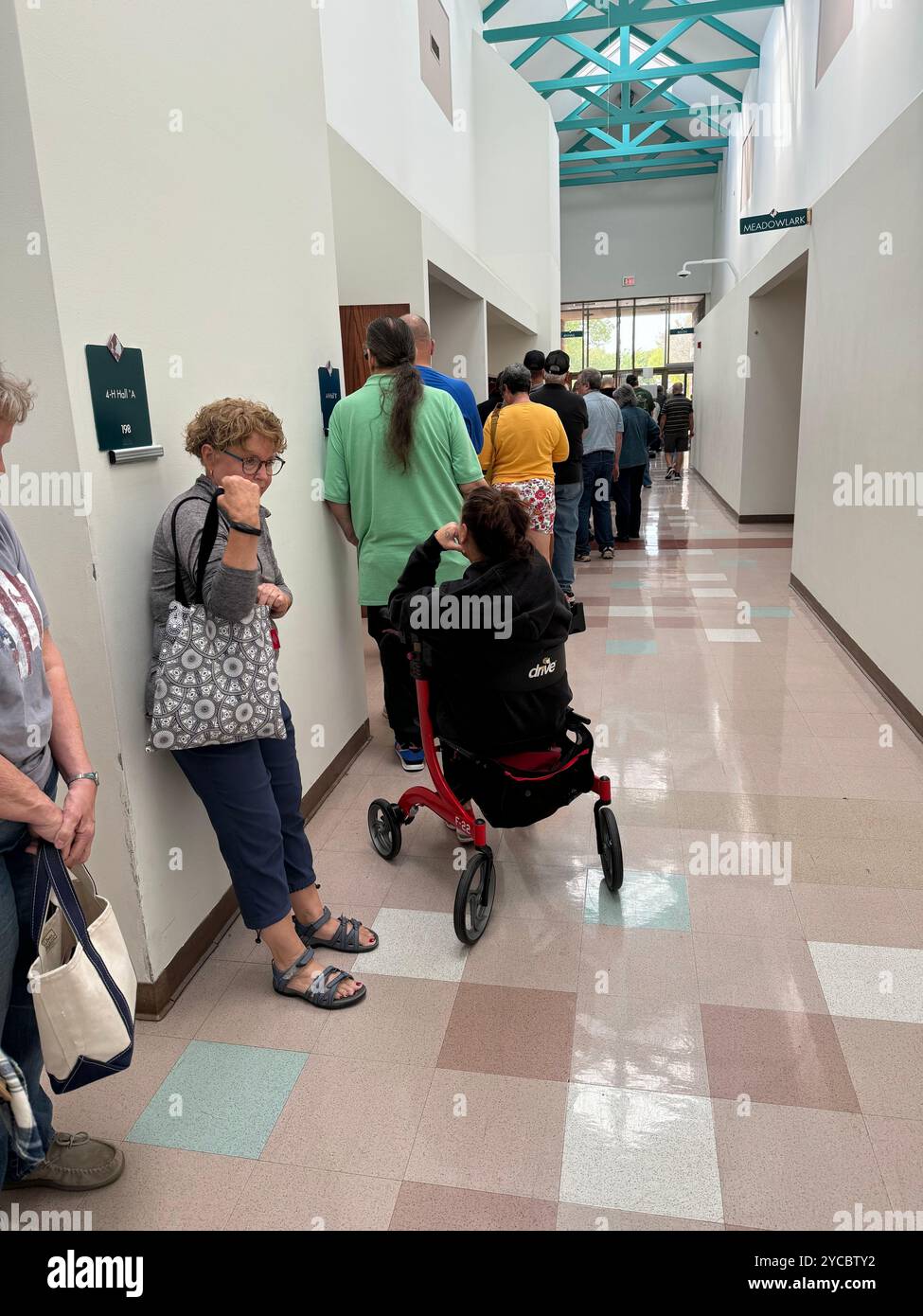 Record-setting people lined up waiting for hours, 1st day of early voting in a presidential election, October 21, 2024 in Wichita, Kansas, USA Stock Photo