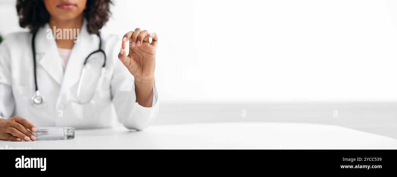 Female african doctor holding hi-res stock photography and images - Alamy