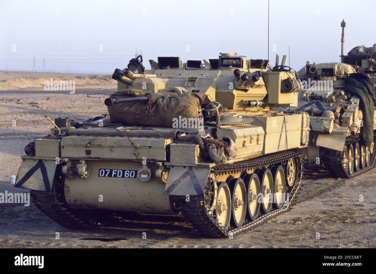 First Gulf War: 10th March 1991 An FV107 Scimitar parked in front of an FV103 Spartan APC, part of a column of armoured vehicles, elements of the British Army's 7th Armoured Brigade, the Desert Rats, preparing to depart Kuwait after the defeat of Iraqi forces in the first Gulf War. Stock Photo