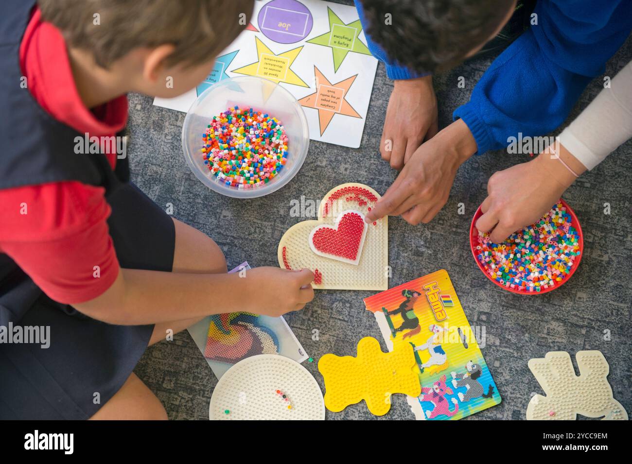 Children Make A Heart Design In An Art Class Stock Photo Alamy