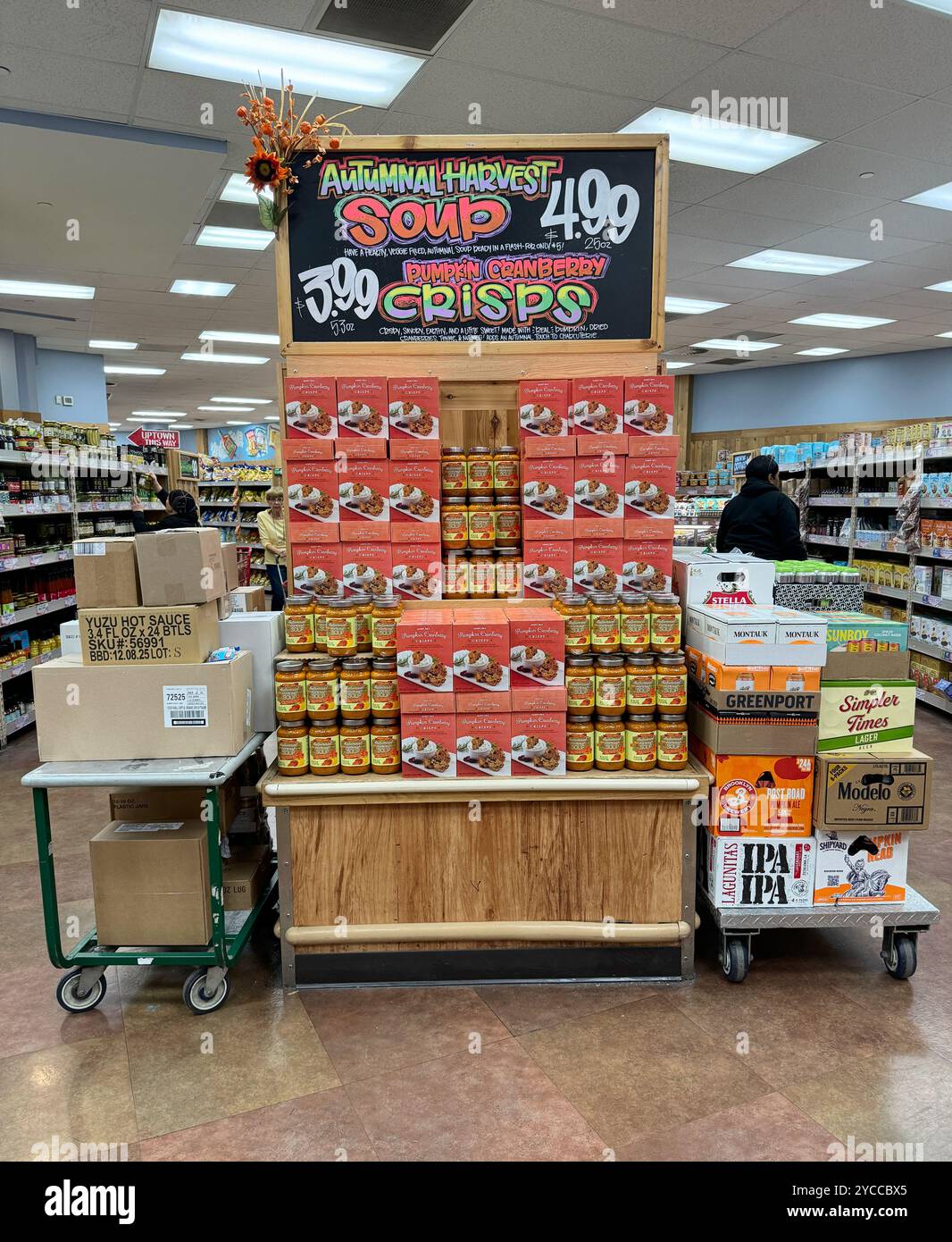 Stand with Autumnal Harvest Soup and Pumpkin Cranberry Crisps at a Trader Joe's store in Manhattan. Stock Photo