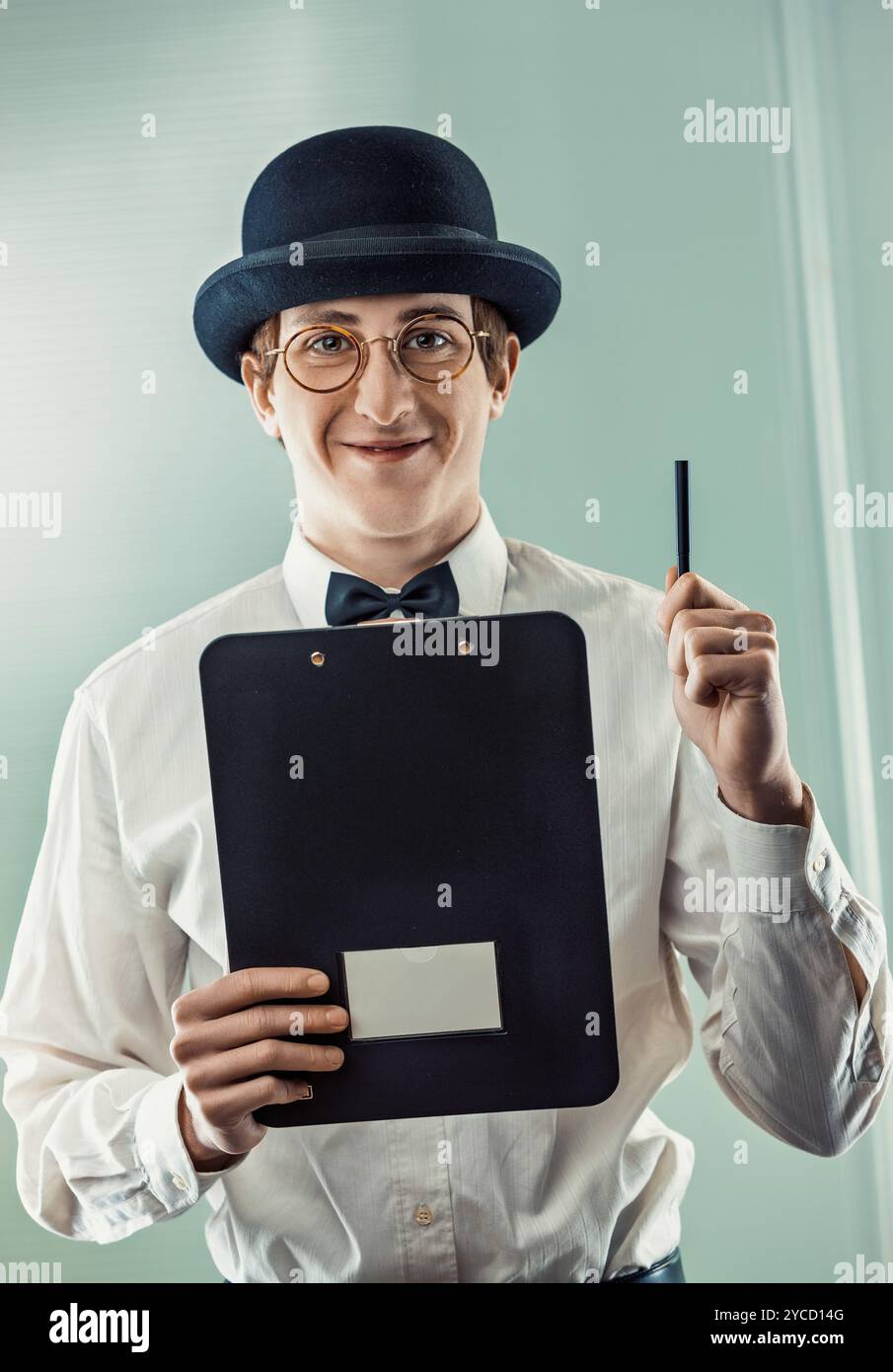 Businessman wearing bowler hat hi-res stock photography and images - Alamy