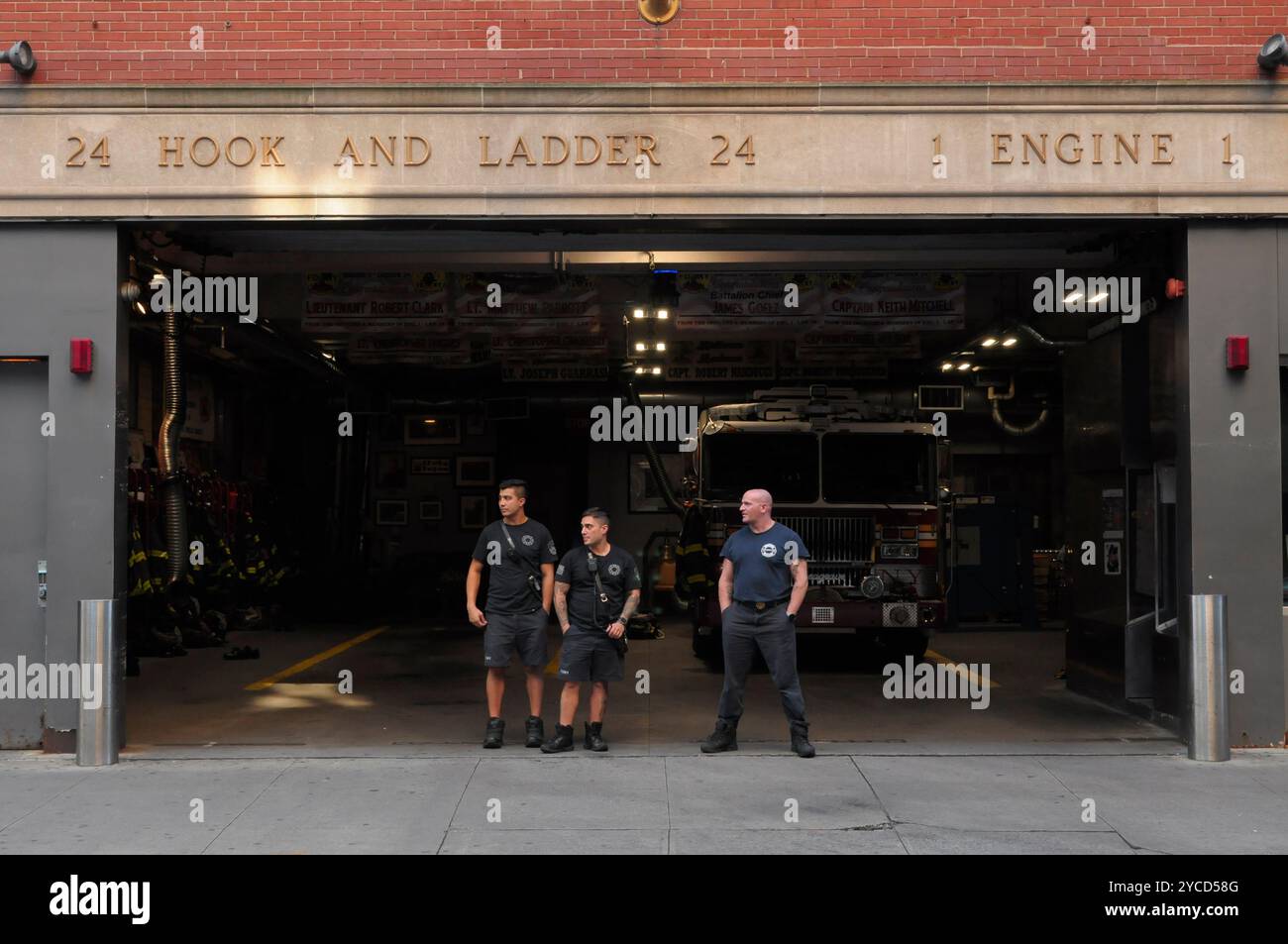 New York City Fire Department members are seen at an FDNY firehouse in ...
