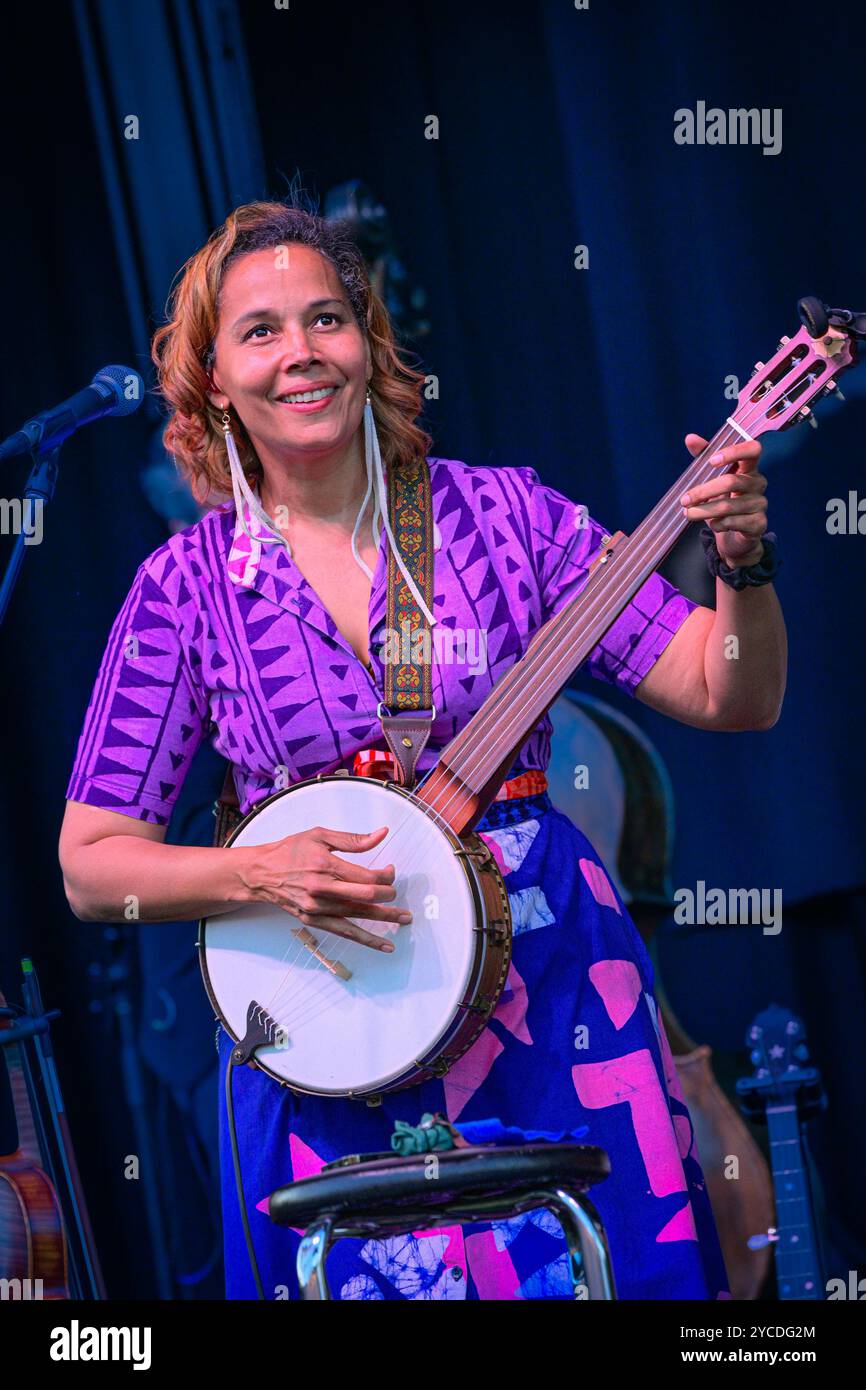 Rhiannon Giddens playing banjo  in concert Stock Photo