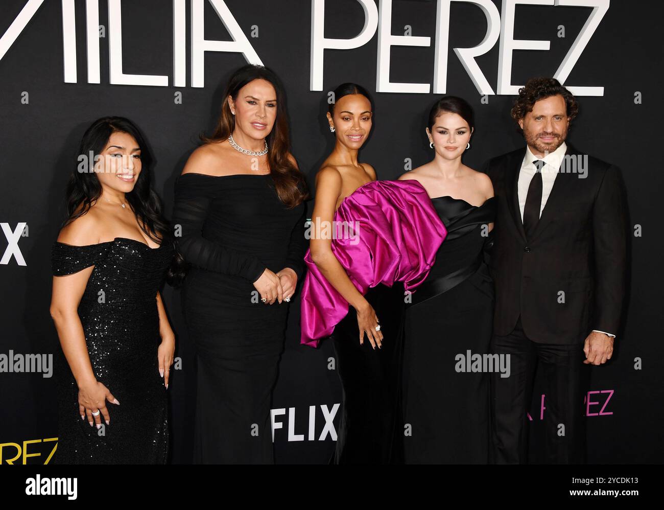 LOS ANGELES, CALIFORNIA - OCTOBER 21: (L-R) Adriana Paz, Karla Sofía Gascón, Zoe Saldana, Selena Gomez and Édgar Ramírez attend the Los Angeles premie Stock Photo