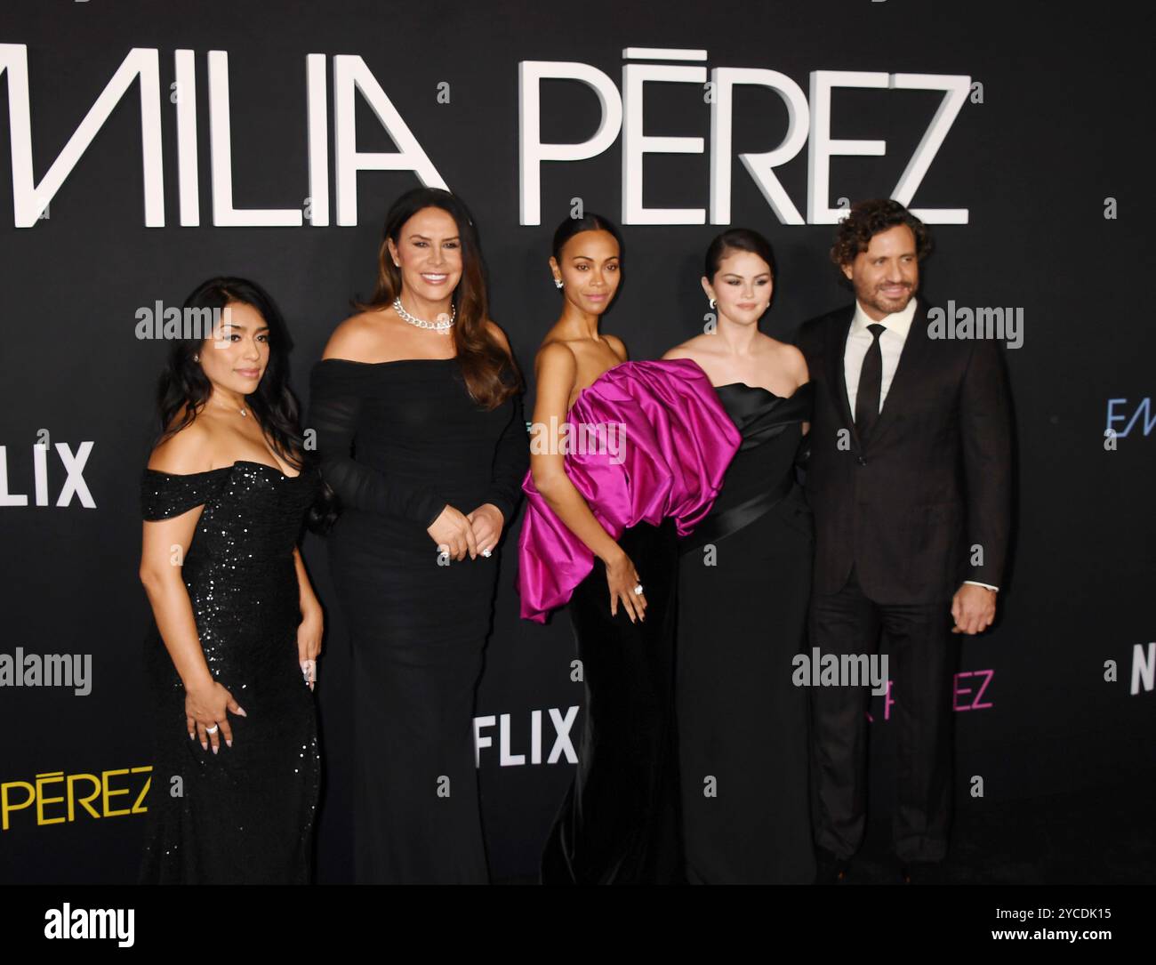 LOS ANGELES, CALIFORNIA - OCTOBER 21: (L-R) Adriana Paz, Karla Sofía Gascón, Zoe Saldana, Selena Gomez and Édgar Ramírez attend the Los Angeles premie Stock Photo