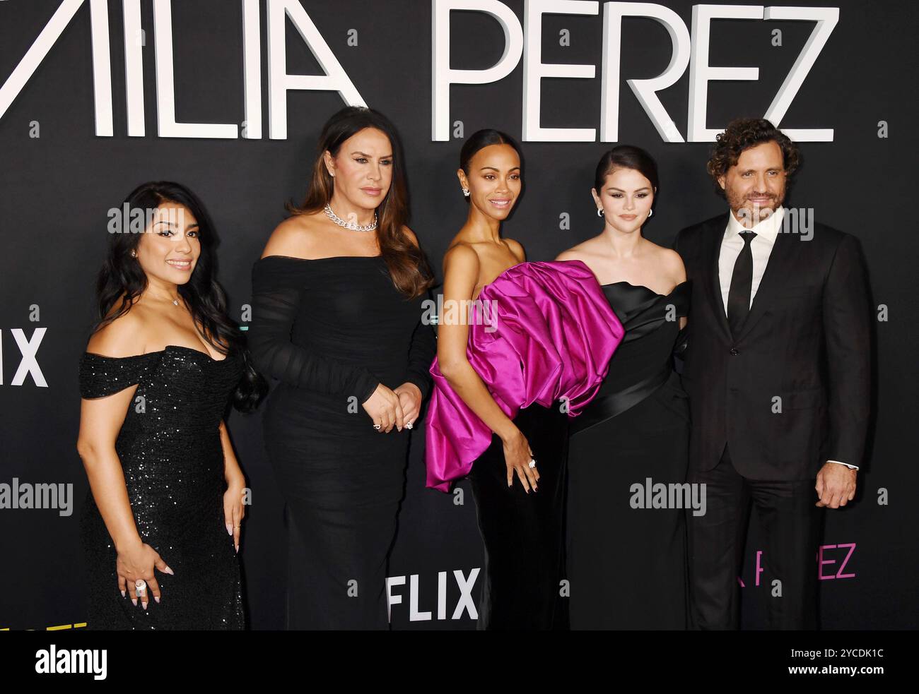 LOS ANGELES, CALIFORNIA - OCTOBER 21: (L-R) Adriana Paz, Karla Sofía Gascón, Zoe Saldana, Selena Gomez and Édgar Ramírez attend the Los Angeles premie Stock Photo