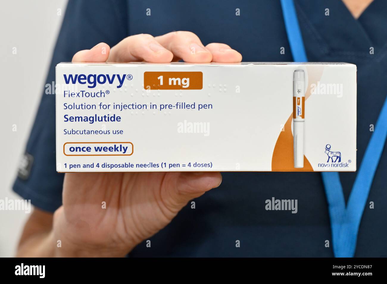 Hands Holding Pre filled Pen Of Semaglutide Diabetes Medication hands-holding-pre-filled-pen-of-semaglutide-diabetes-medication