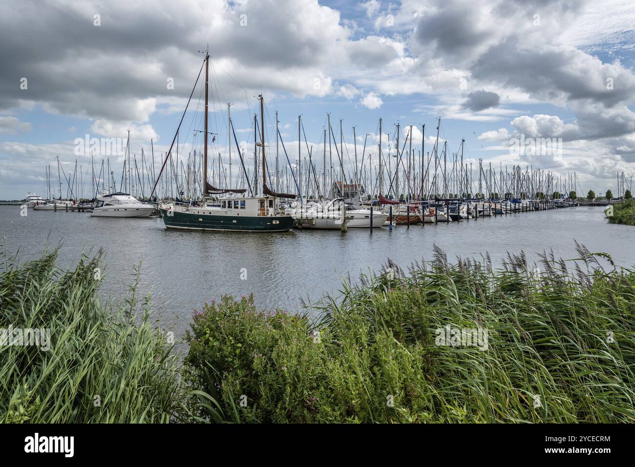 Veolendam, Netherlands, August 08, 2016. Ships moored in the marina of Volendam. Volendam is a popular tourist attraction in the Netherlands, well kno Stock Photo