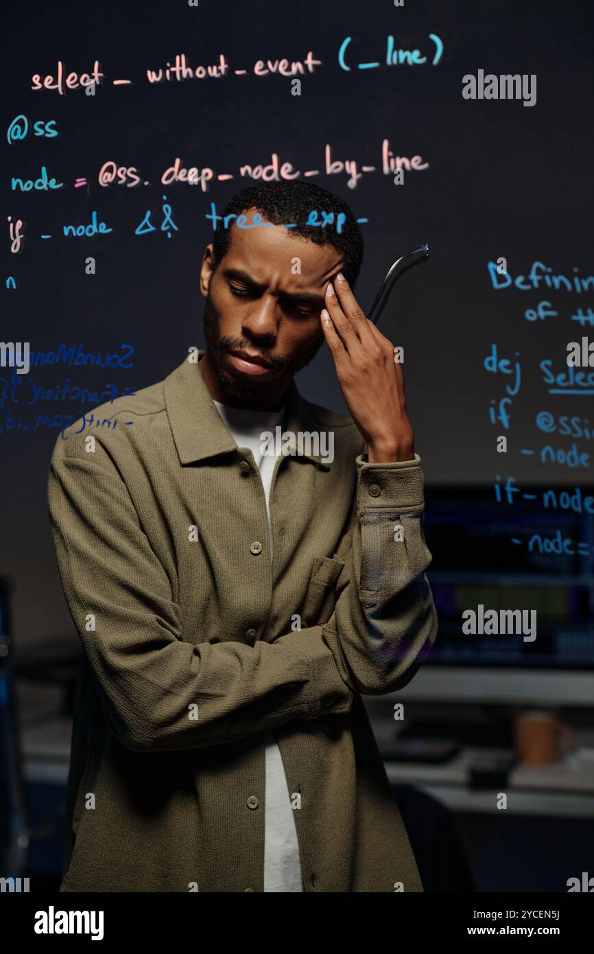 Concentrating on Developing Code in Modern Office Stock Photo