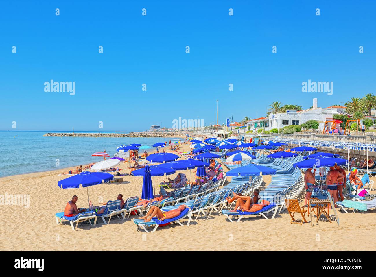 Sitges, Spain - June 14, 2017 : View of the beach and the sea shore of a small resort town Sitges in the suburbs of Barcelona. Stock Photo