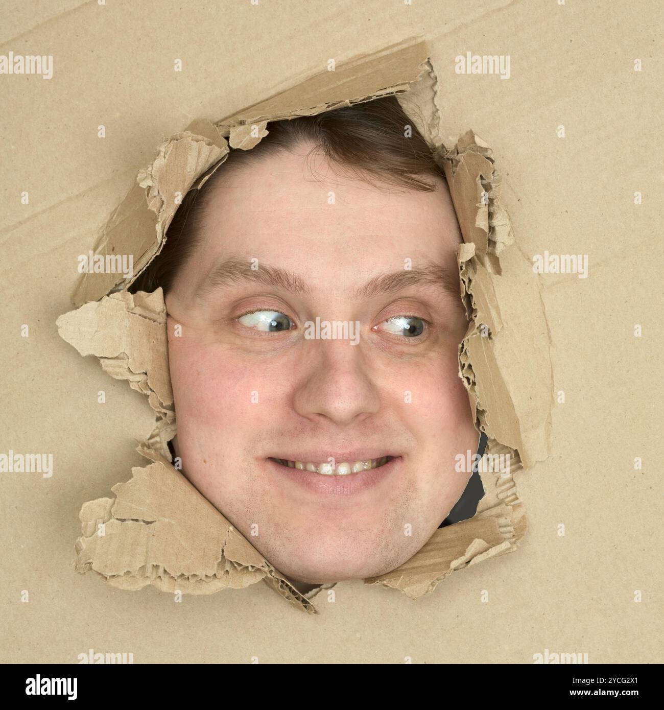 Face in the hole hi-res stock photography and images - Alamy