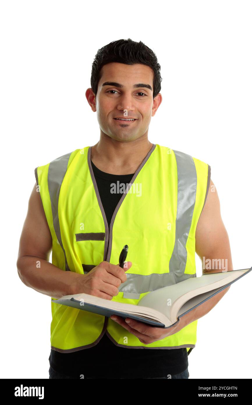 Construction worker with pen and book Stock Photo
