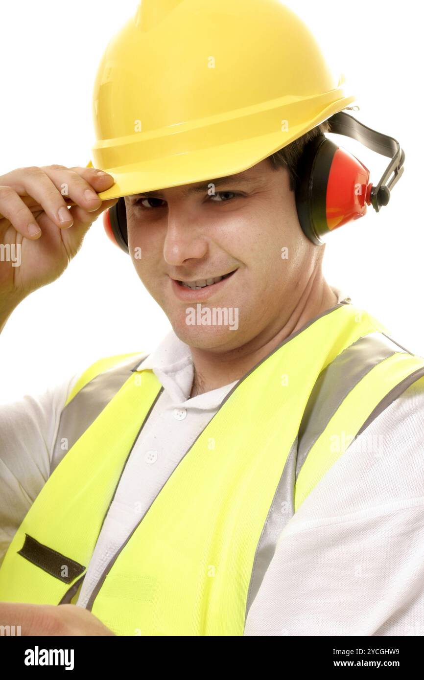 Friendly tradesmen tipping his hat Stock Photo