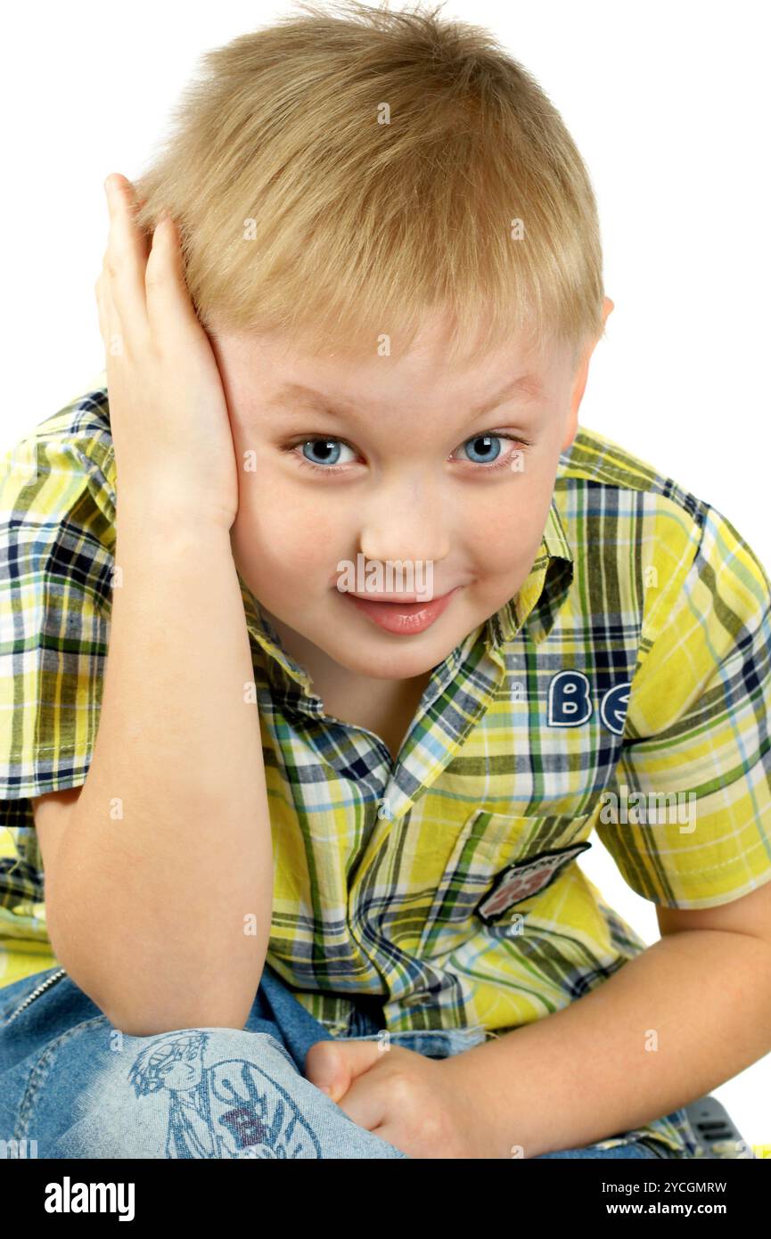 The portrait of the boy of the blonde which smiles Stock Photo - Alamy