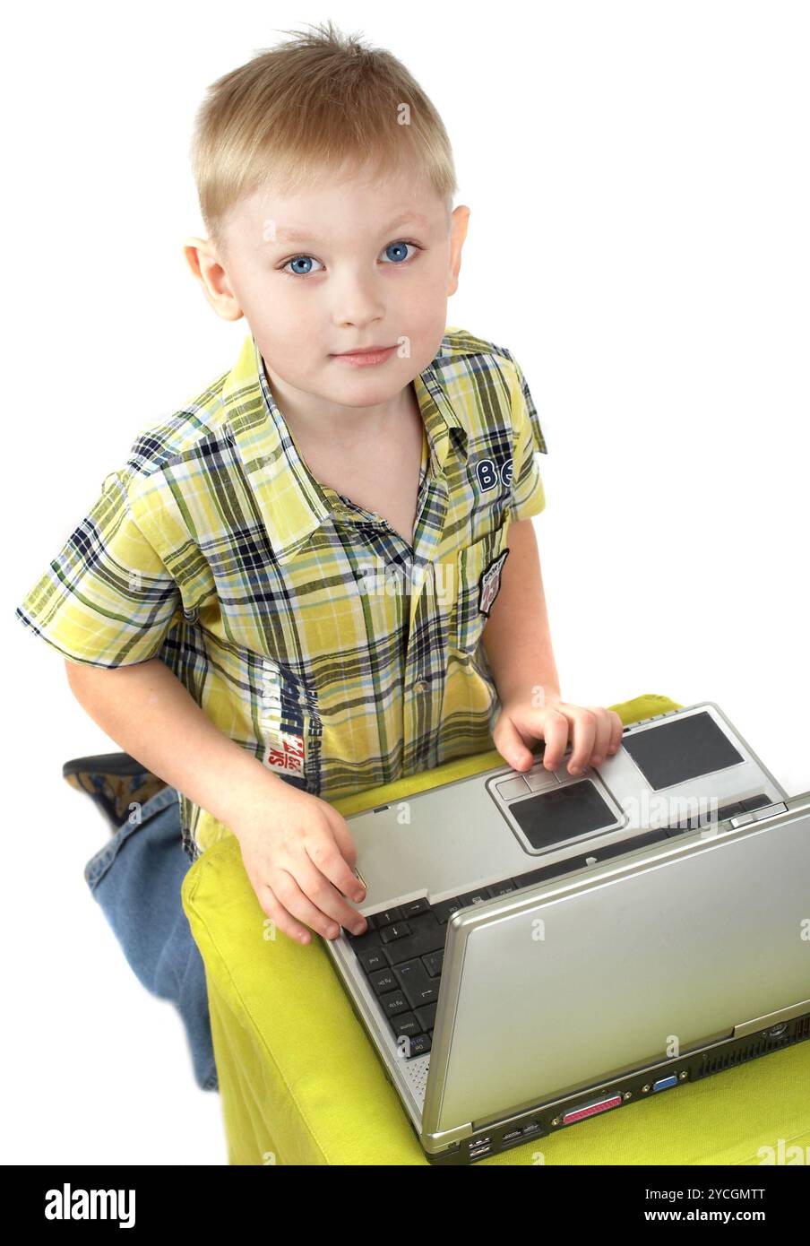 The boy the blonde is engaged with a computer Stock Photo - Alamy