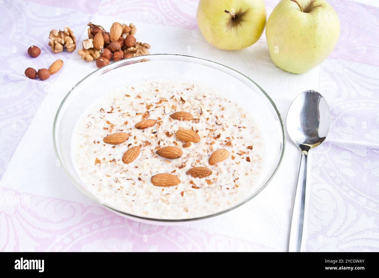 Kasha with milk and nuts Stock Photo