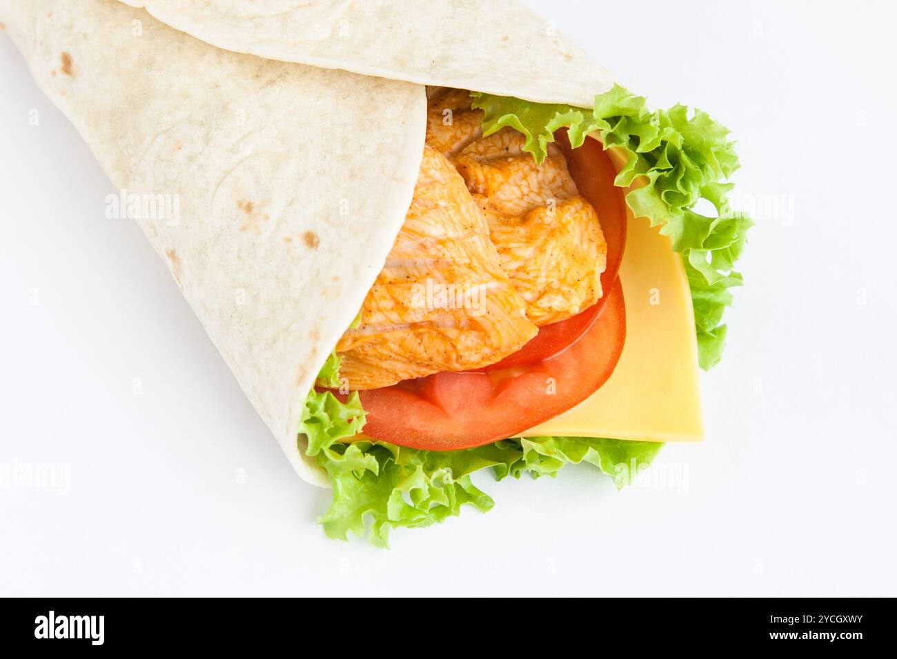 Roll from lavash with chicken, cheese and vegetables Stock Photo