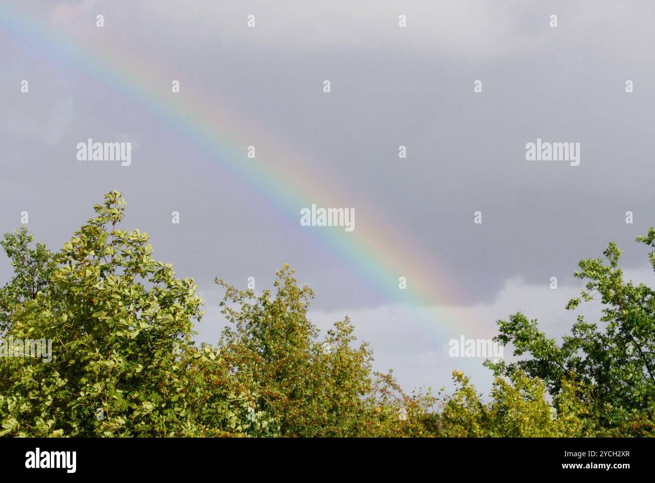 Rainbow dark clouds hi-res stock photography and images - Alamy