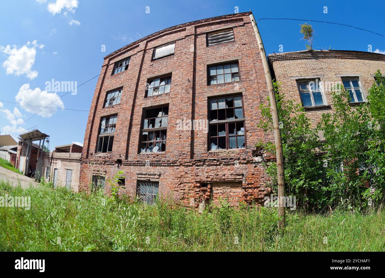 Old abandoned building against blue sky in summer day Stock Photo - Alamy