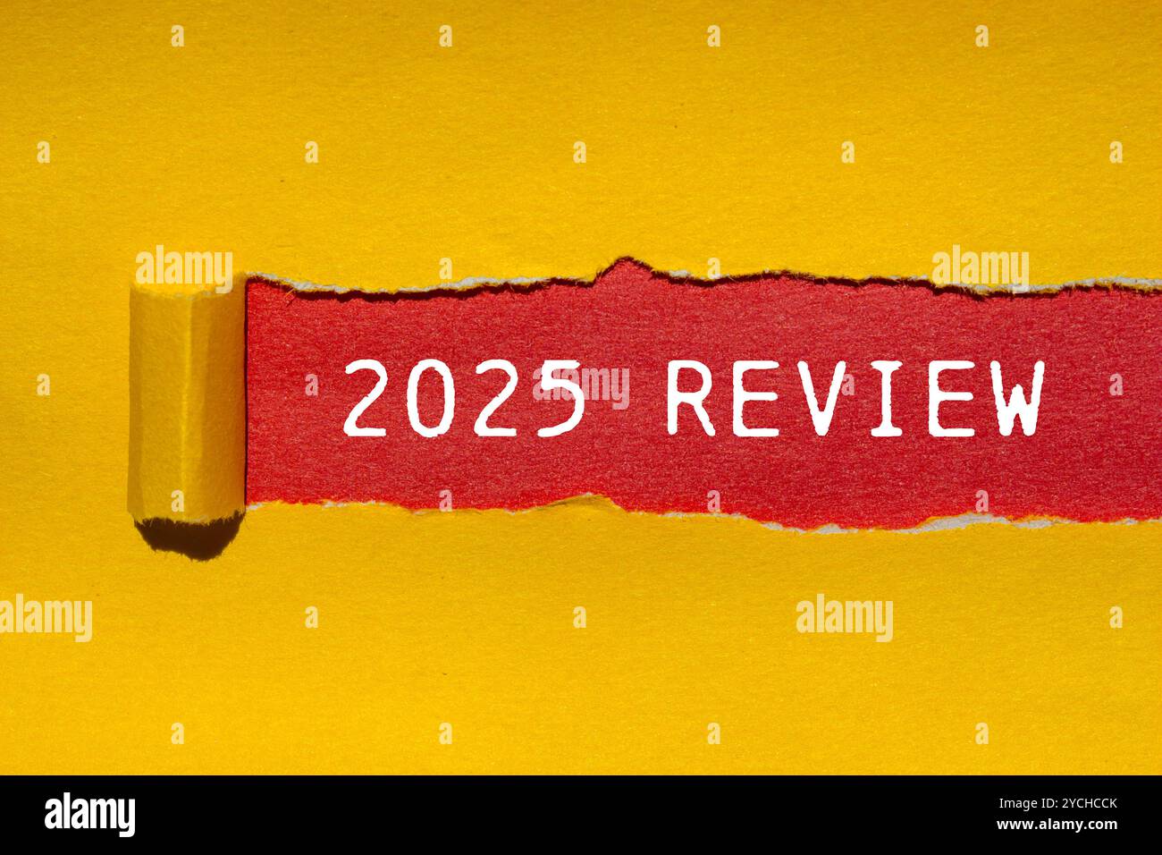 2025 Review Message Written On Ripped Torn Yellow Paper With Red 2025 Review Message Written On Ripped Torn Yellow Paper With Red