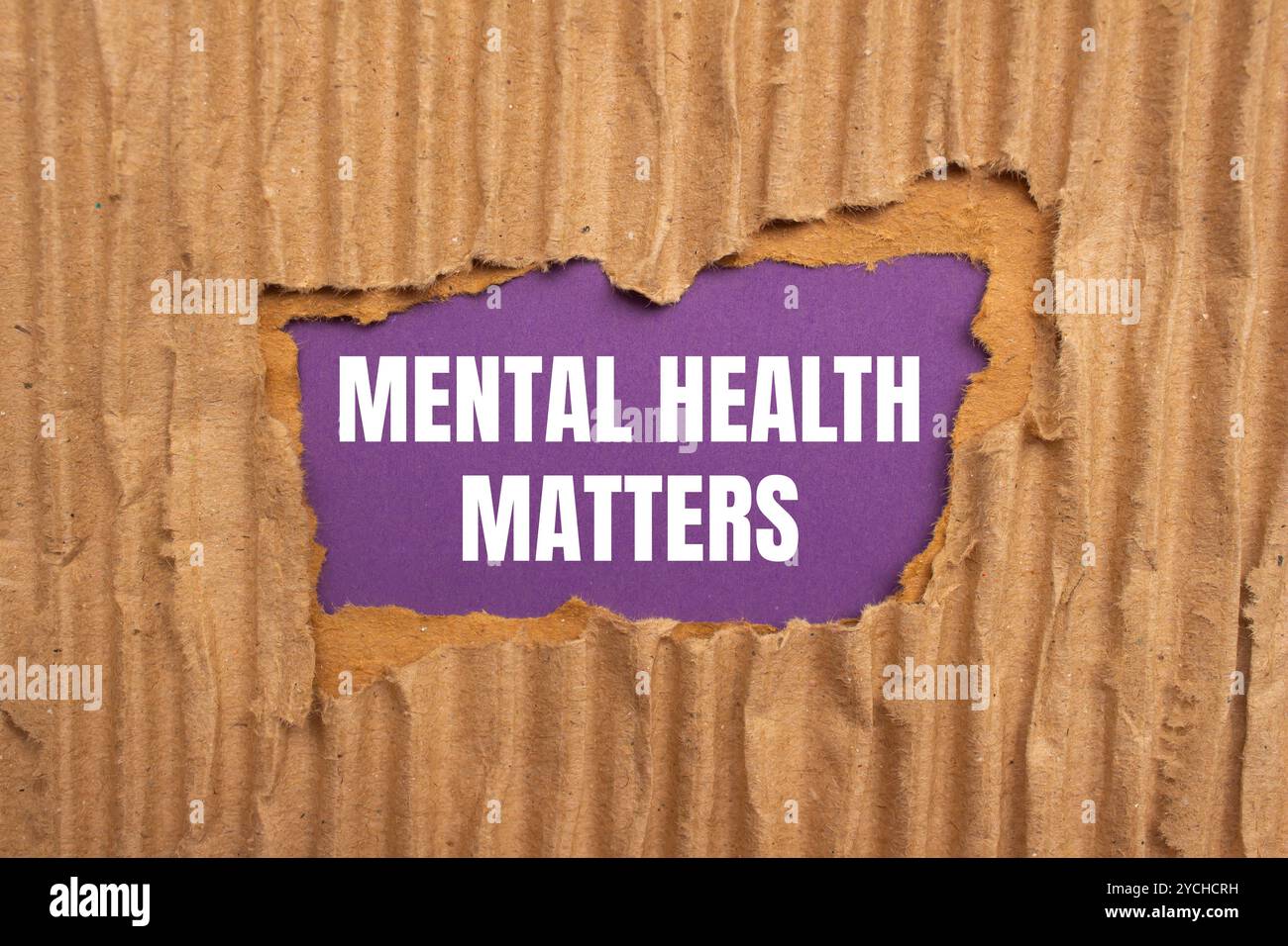Mental health matters message written on ripped torn cardboard paper ...
