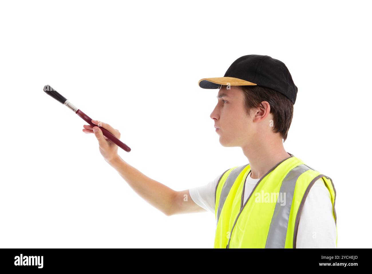 Painter decorator with paint brush Stock Photo