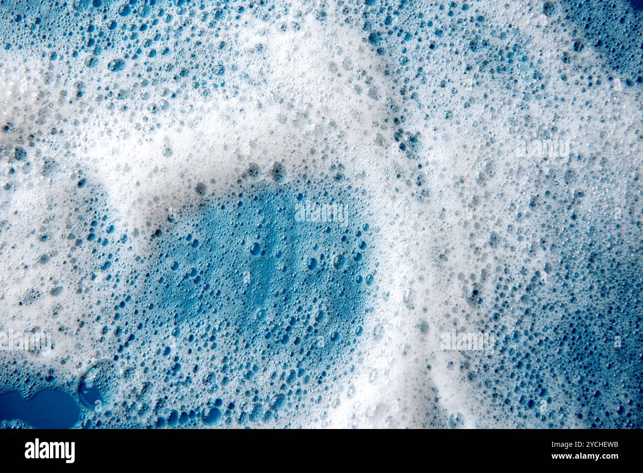 Background and pattern. White soap foam with bubbles, texture on blue ...