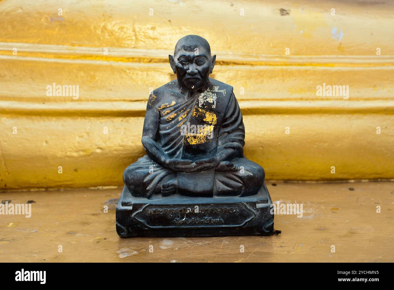 Black monk statue in Wat Phra Yai Temple. Thailand Stock Photo