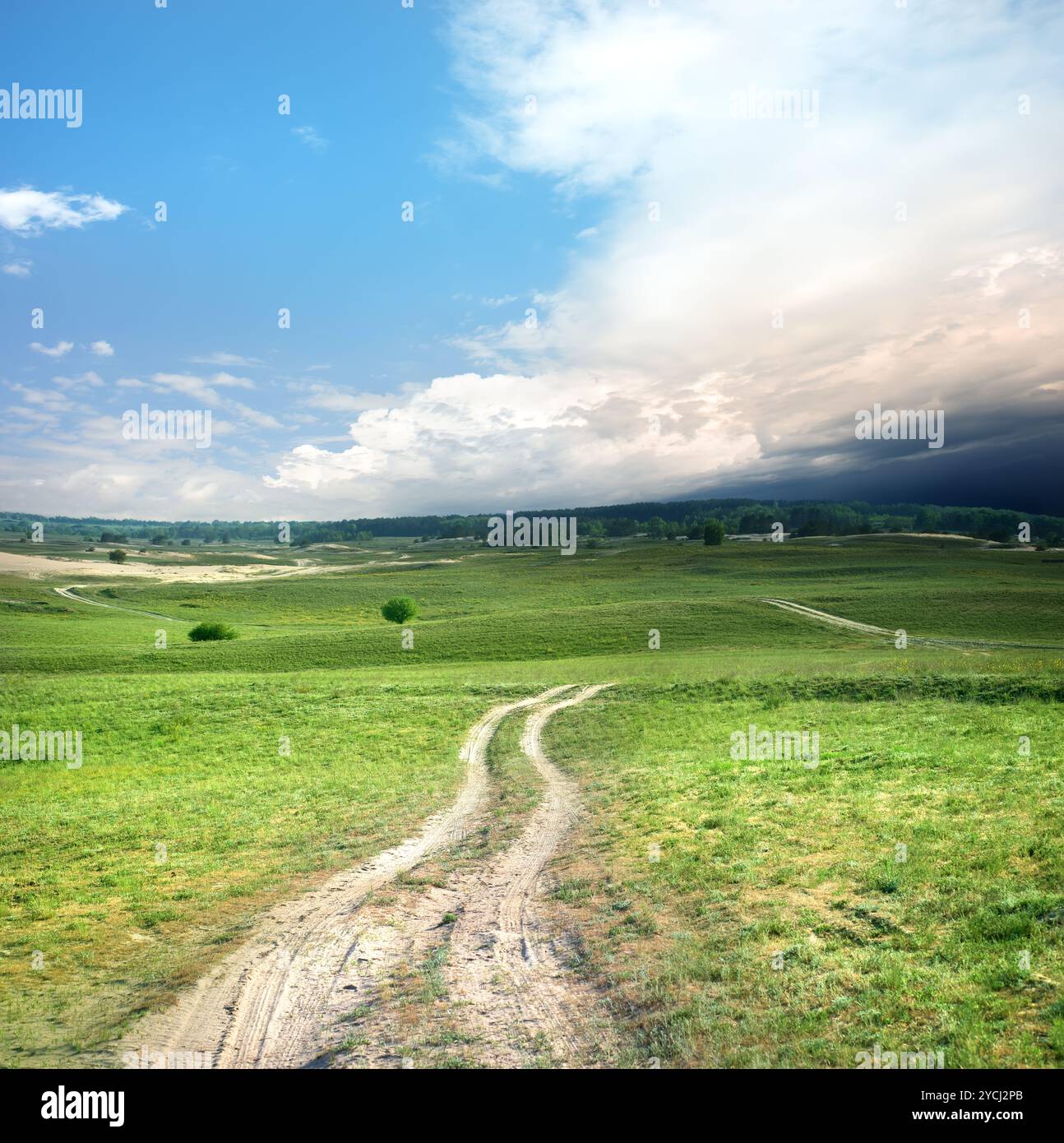 Road and storm clouds Stock Photo - Alamy