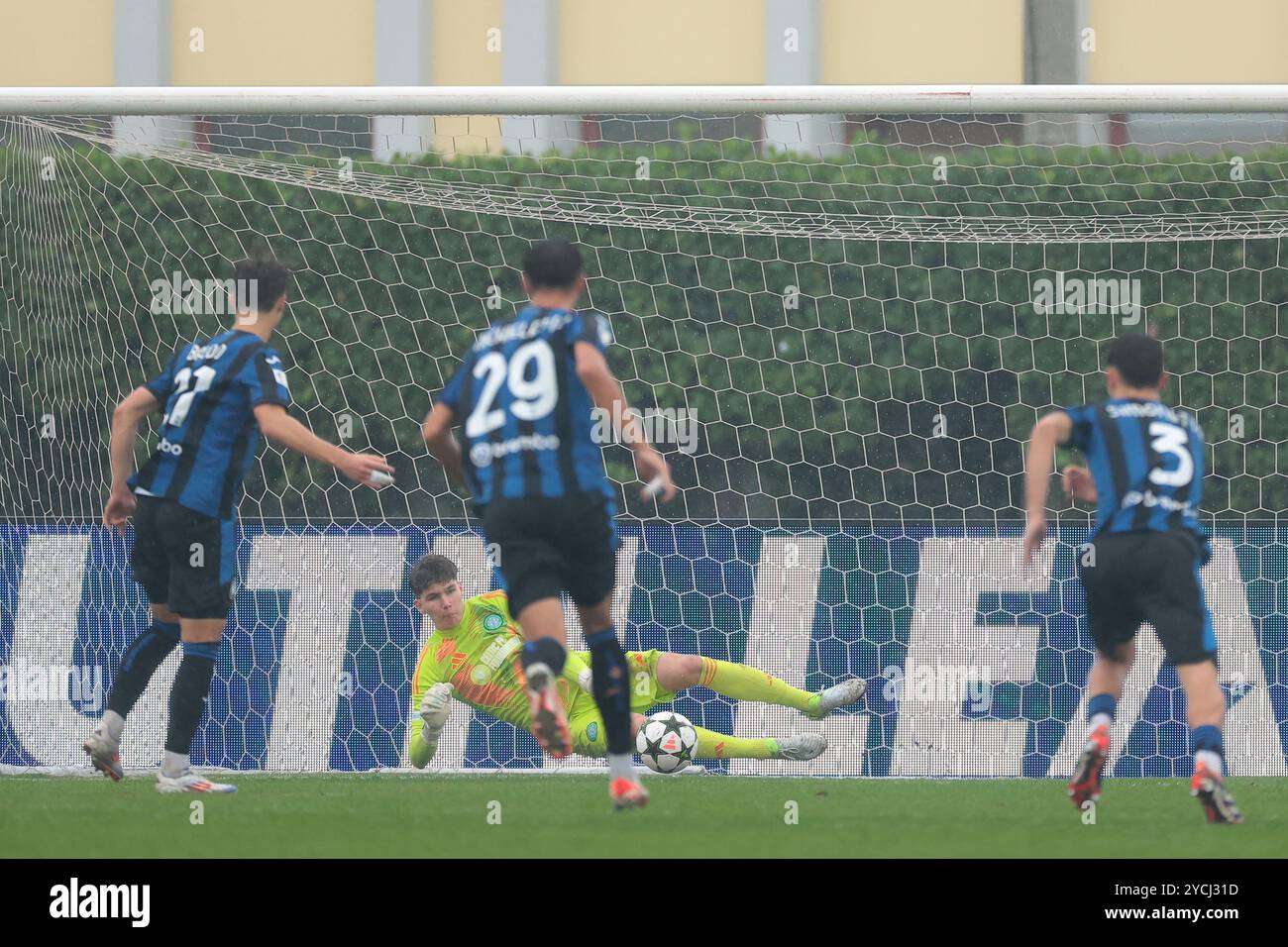 Caravaggio, Italy, 23rd October 2024. Aidan Rice of Celtic saves a ...