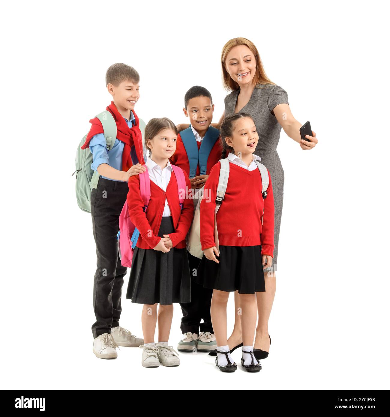 Mature teacher with little pupils on white background Stock Photo - Alamy