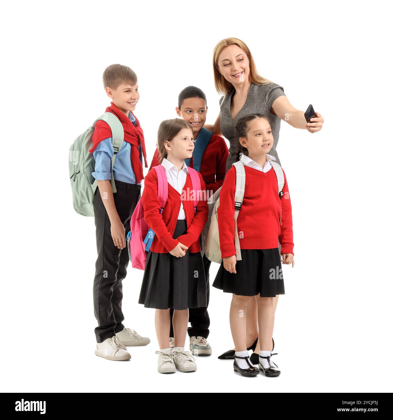 Mature teacher with little pupils on white background Stock Photo - Alamy